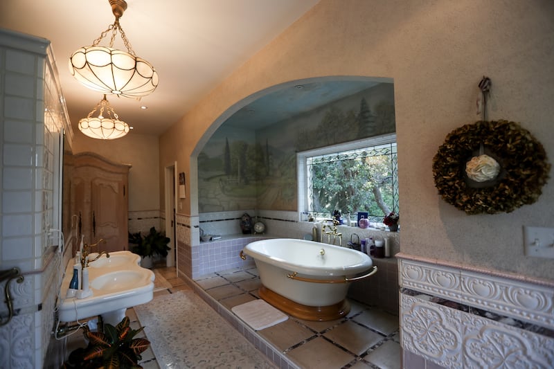 A bathroom inside the historic Walker family estate on Walker Lane in Holladay is pictured on Thursday, Aug. 9, 2018. The home was originally built in 1895 by the Walker family and has been occupied by Jeff and Nancy Flamm and their family since 1997.