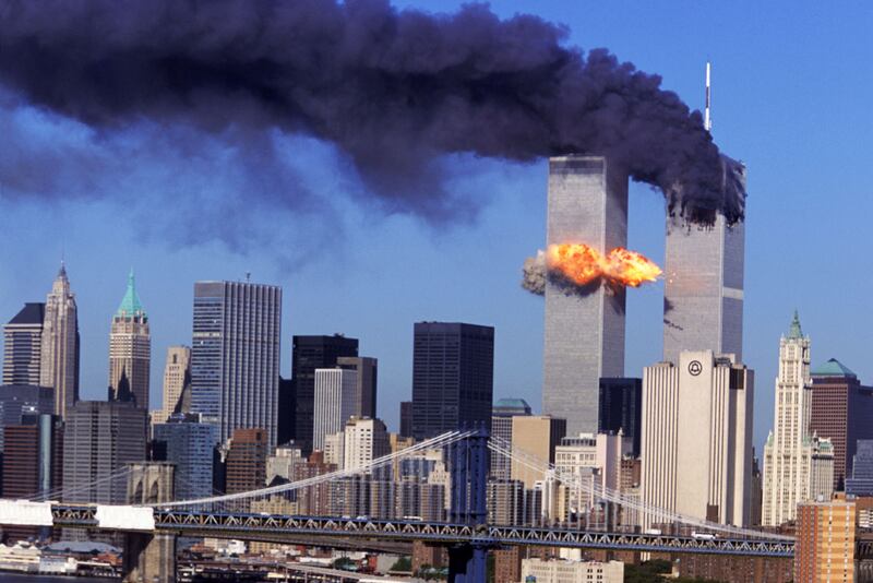 Hijacked United Airlines Flight 175 crashes into the south tower of the World Trade Towers Sept, 11, 2001, as the north tower burns.