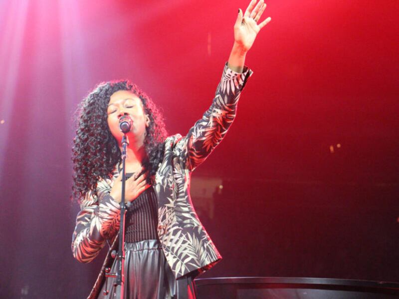 Singer, songwriter and "America's Got Talent" contestant Sharon Irving leads worship on Oct. 21, 2016, at the Belong Tour stop at the Xcel Energy Center in St. Paul, Minn.