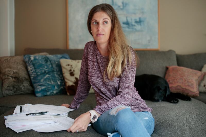 Kimberley Cashin poses for a portrait at her home in Portola Valley, California, Friday, Nov. 10, 2017. Cashin pays over $1,800 per month for her non-Covered California health insurance plan. She has Ehlers-Danlos syndrome and myasthenia gravis.