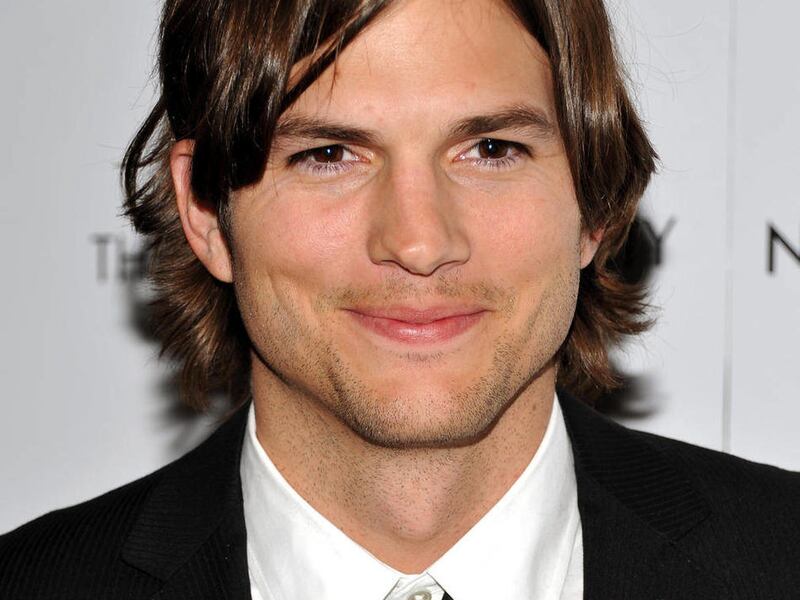 FILE - In this Jan. 20, 2011 file photo, actor Ashton Kutcher attends a special screening of "No Strings Attached" in New York. Kutcher is giving his Twitter followers a clue that he may be joining "Two and a Half Men" "” or he's punking them. A tweet Wed