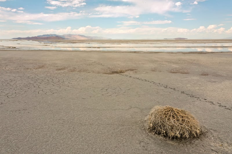 Record low water levels are seen in the Great Salt Lake from a dry Antelope Island.