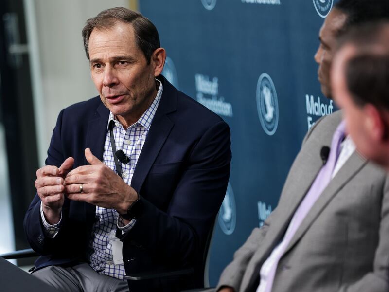 Rep. John Curtis, R-Utah, speaks to journalists during a summit at the Malouf Foundation.