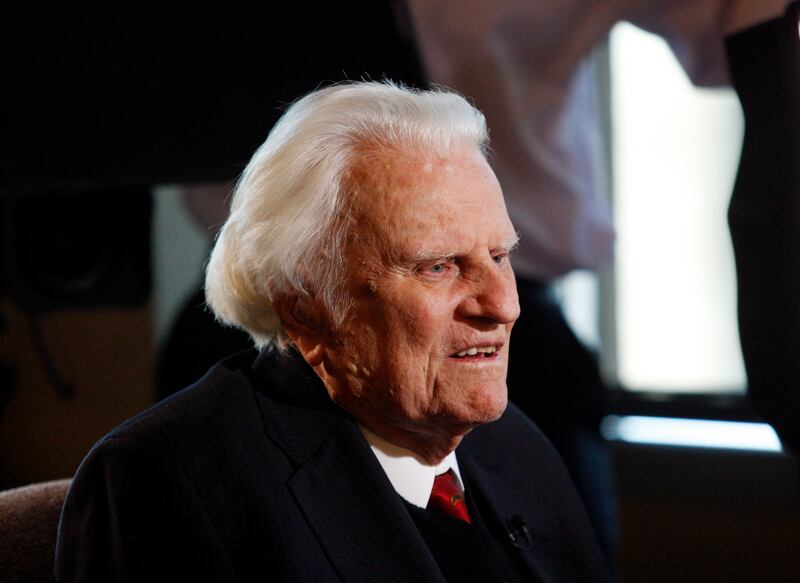 FILE - In this Dec. 20, 2010 file photo, evangelist Billy Graham, 92, speaks during an interview at the Billy Graham Evangelistic Association headquarters in Charlotte, N.C. Graham, who transformed American religious life through his preaching and activis