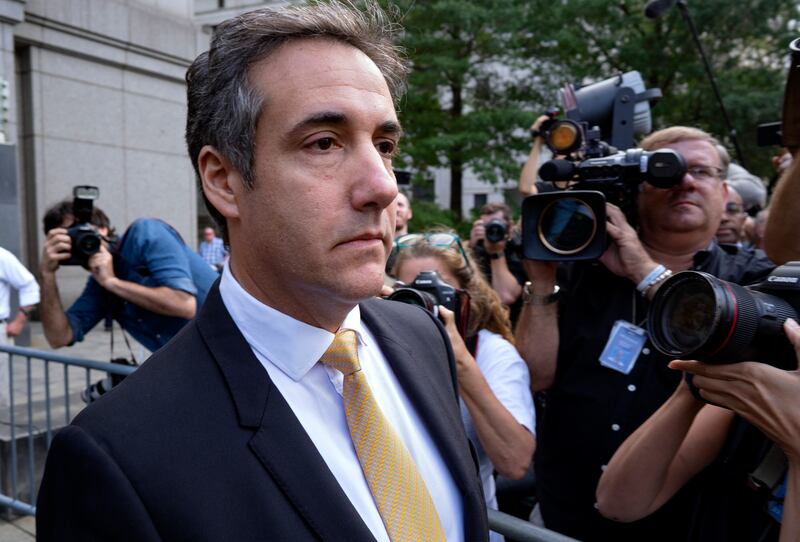 FILE - In this Aug. 21, 2018 file photo, Michael Cohen, former personal lawyer to President Donald Trump, leaves federal court after reaching a plea agreement in New York. On Thursday, Sept. 20, 2018, via Twitter, Cohen praised himself for providing “crit