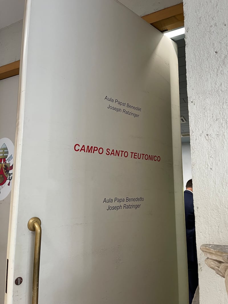 The door to Pope Benedict Hall is shown. The hall is named for Joseph Ratzinger, who served as pope before Pope Francis.