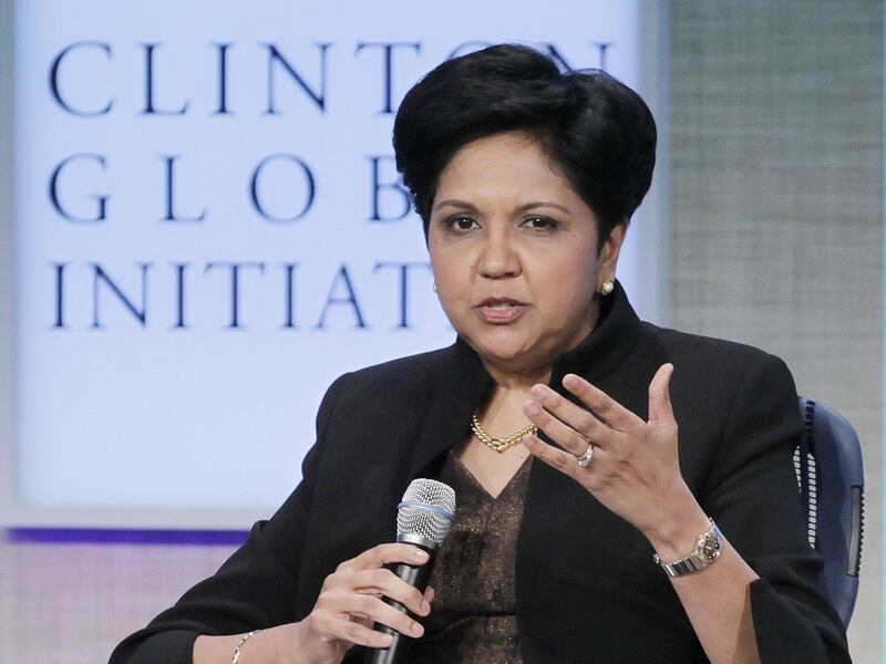FILE - Indra Nooyi, Chairman and CEO of PepsiCo, participates in a panel discussion at the Clinton Global Initiative, Wednesday, Sept. 21, 2011 in New York. Women may be badly outnumbered in the top ranks of corporate America, but at least they aren't und