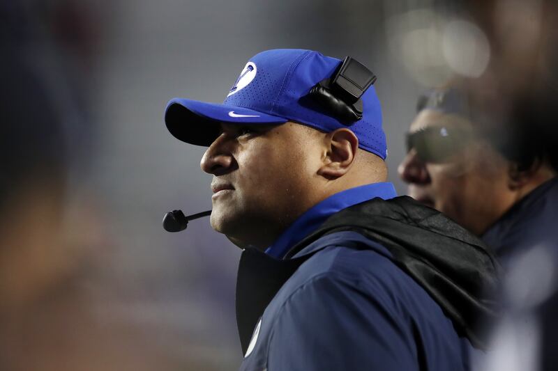 BYU coach Kalani Sitake watches the action as BYU and UAB play in Independence Bowl in Shreveport, Louisiana, Dec. 18, 2021.