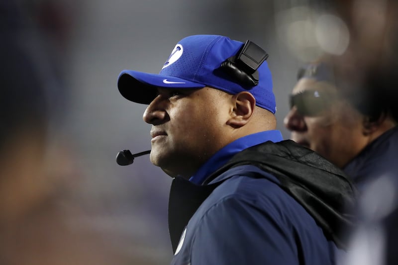 BYU coach Kalani Sitake watches the action as BYU and UAB play in Independence Bowl in Shreveport, Louisiana, Dec. 18, 2021.