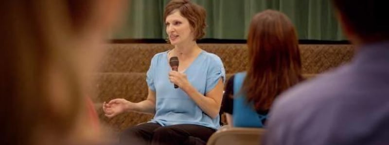 Meg Johnson speaks to a group of students in the short film, "Falling Up."