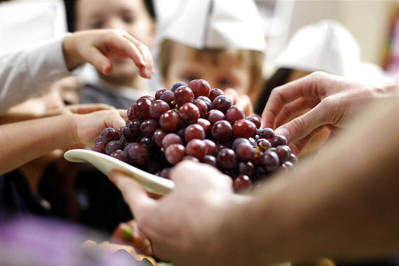 Teaching kids to make proper food choices — such as eating grapes — is key, but there are other ways to get them to eat what they should.