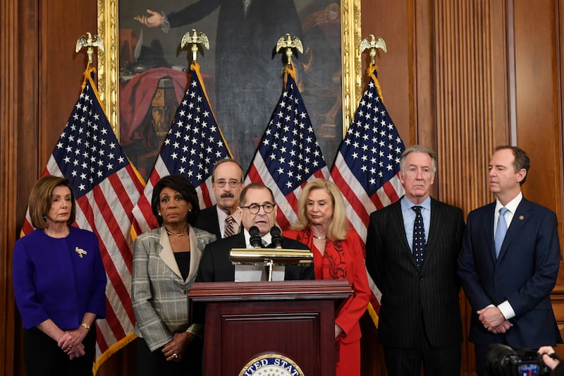 House Speaker Nancy Pelosi, Chairwoman of the House Financial Services Committee Maxine Waters, D-Calif., Chairman of the House Foreign Affairs Committee Eliot Engel, D-N.Y., House Judiciary Committee Chairman Jerrold Nadler, D-N.Y., Chairwoman of the House Committee on Oversight and Reform Carolyn Maloney, D-N.Y., House Ways and Means Chairman Richard Neal and Chairman of the House Permanent Select Committee on Intelligence Adam Schiff, D-Calif., unveil articles of impeachment against Trump