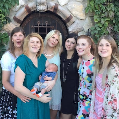 Carol Lynch Williams (left) pictured with her five daughters and grandchild.