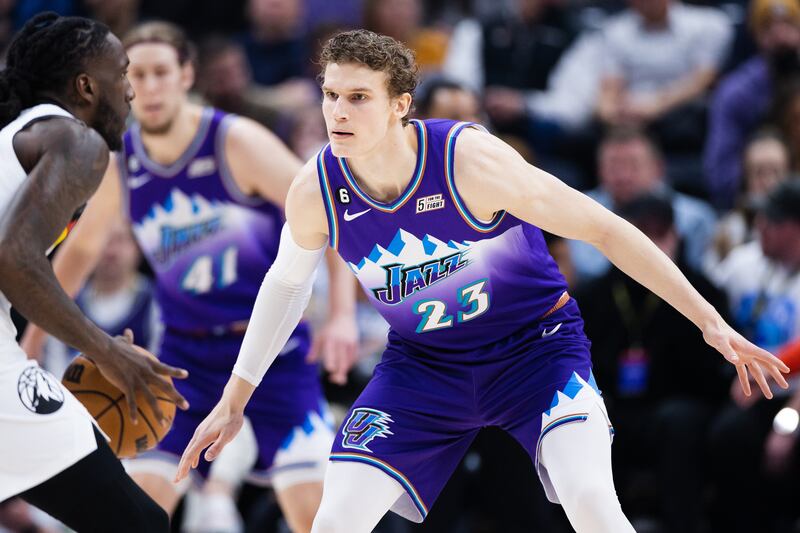 Utah Jazz forward Lauri Markkanen (23) defends Minnesota Timberwolves forward Taurean Prince (12) during an NBA game at Vivint Arena in Salt Lake City on Wednesday, Feb. 8, 2023.