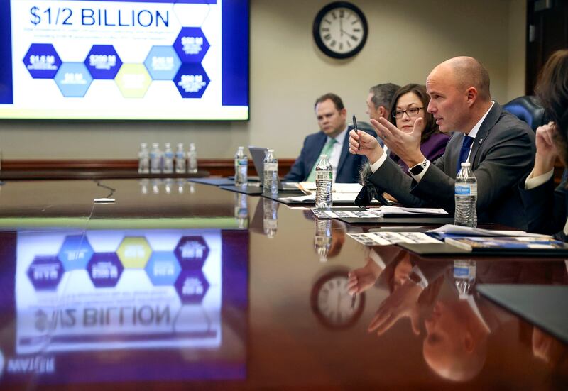 Gov. Spencer Cox, right, talks about state budget recommendations with the KSL and Deseret News editorial boards.
