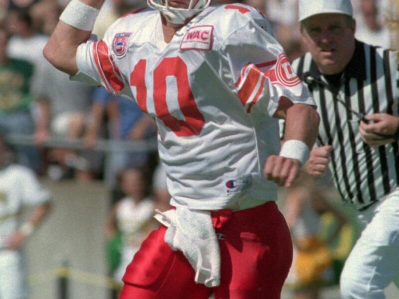 FILE: Utah quarterback Mike McCoy scrambles during the Utes' 1994 game against Oregon. Utah won, 34-16.