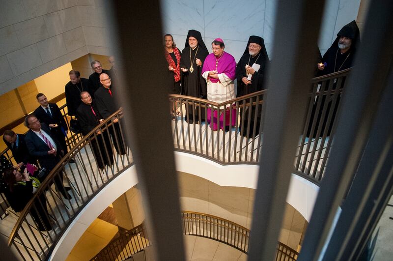 Christian religious leaders make their way to the Capitol Rotunda for a prayer following The Early Christian Church: An Ecumenical Prayer Service in the Christian Languages of the Middle East in the Capitol Visitor Center at the United States Capitol in W