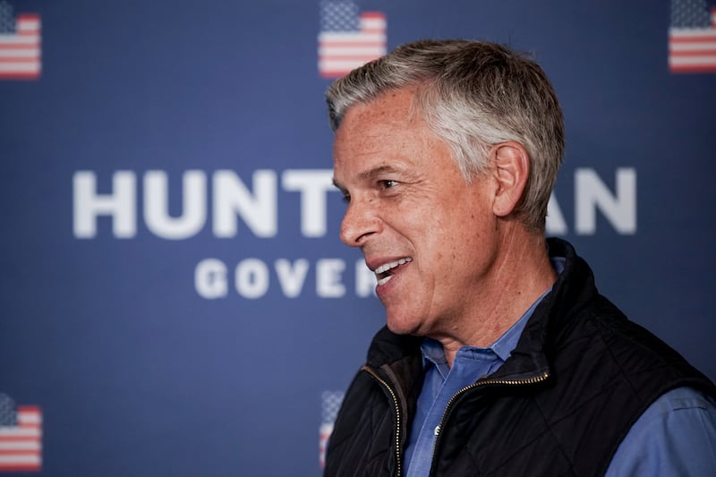 Jon Huntsman Jr. talks to journalists at his campaign office in Salt Lake City.