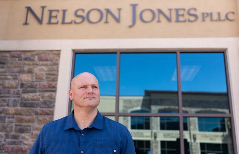 Scott Stephenson, the new head of the Utah Fraternal Order of Police, stands outside of Nelson Jones, a law firm in Sandy, on Thursday, Aug. 11. Stephenson now works with the law firm in his new role representing police officers.