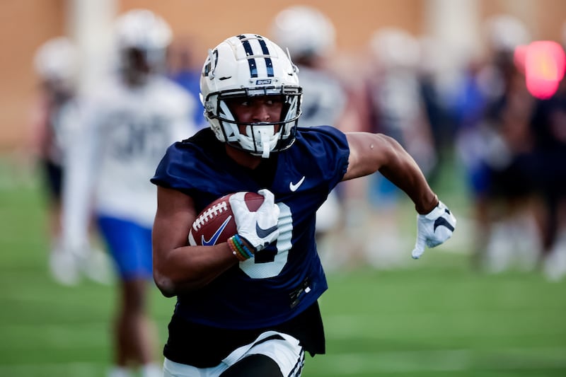 BYU wide receiver Kody Epps goes through drills during practice at the Indoor Practice Facility.