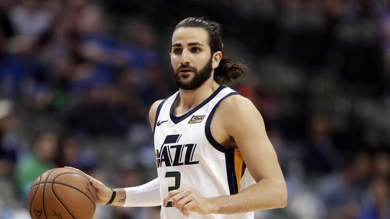 Utah Jazz's Ricky Rubio (3) handles the ball in the second half of an NBA basketball game against the Dallas Mavericks on Thursday, March 22, 2018, in Dallas. (AP Photo/Tony Gutierrez)