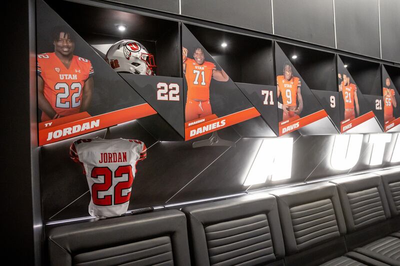 Ty Jordan’s retired jersey is displayed inside the home team locker room in the new Ken Garff Red Zone at Rice-Eccles Stadium.