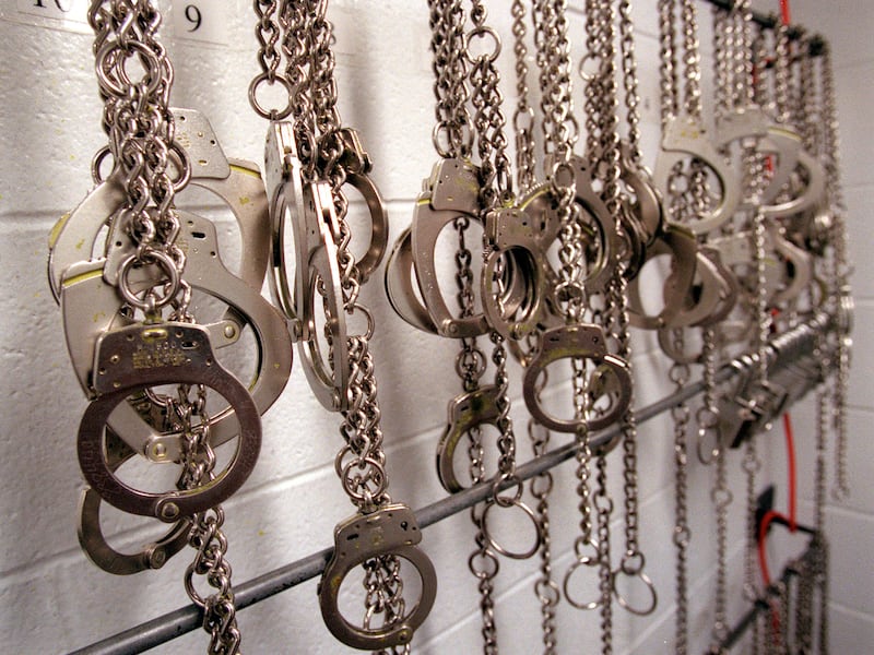 Handcuffs and shackles hang at the Utah State Prison in an undated file photo.