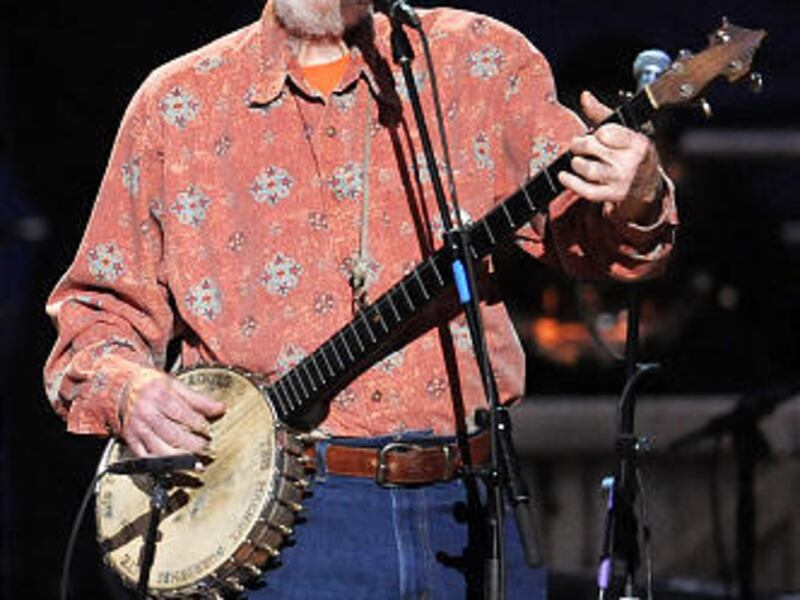 Pete Seeger performs at the benefit concert celebrating his 90th birthday at Madison Square Garden in New York.