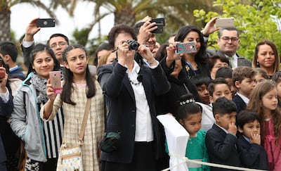 Attendees photograph President Russell Nelson during the cornerstone ceremony of the Concepción Chile Temple on Sunday, Oct. 28, 2018, in Concepcion, Chile.