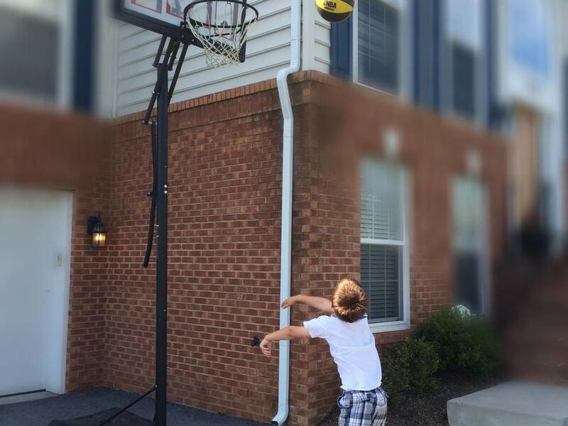 Koleson Wright practices at "dad height" outside his home in Woodstock, Virginia.