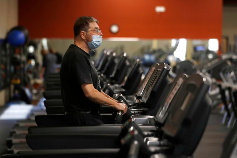 A man works out on a treadmill.