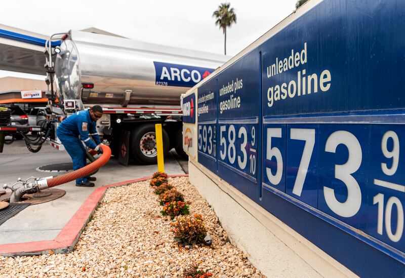 A gas tank driver delivers 8,500 gallons of gasoline to an ARCO gas station in Riverside, Calif., Saturday, May 28, 2022.