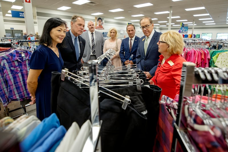 Audrey Case, and her husband, Rep. Ed Case, D-Hawaii, Daryl Evans, assistant manager of The Church of Jesus Christ of Latter-day Saints’ bishop’s storehouse, Evie Stewart, and her husband, Rep. Chris Stewart, R-Utah, and Chris Lansing, director of Church Hosting, listen to Erlynn Lansing, director of Church Hosting, during a tour of Welfare Square in Salt Lake City.