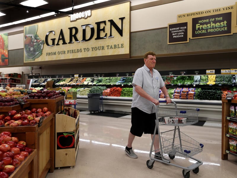 FILE - Dale Anderson, of Murray, shops at Macey's in Sandy on Wednesday, Aug. 2, 2017. Grabbing free samples while shopping is a tradition consumers have come to expect at major warehouse retailers, but does sampling actually increase sales and encourage