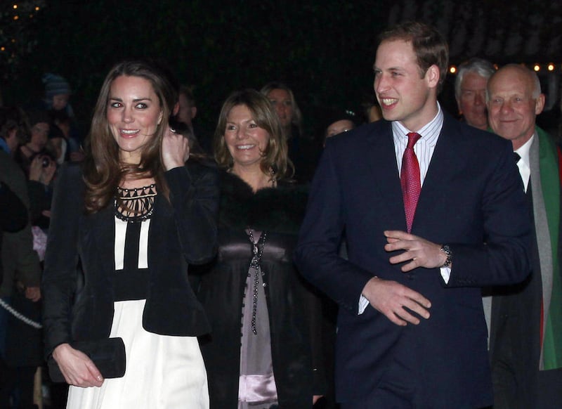 Britain's Prince William and his fiancee Kate Middleton arrive to view the Thursford Christmas Spectacular gala in Thursford, England, Saturday, Dec. 18, 2010. The royal couple, who are due to marry on April 29, 2011, met young cancer patients and visite