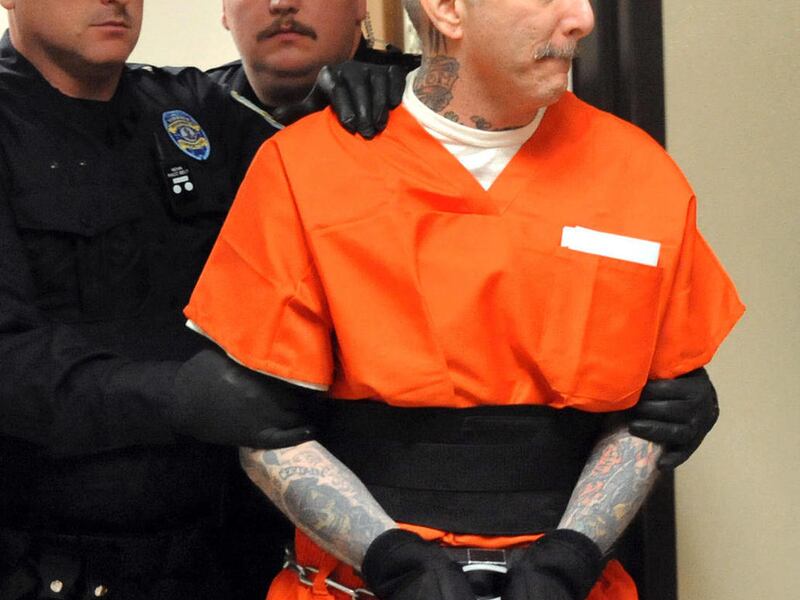 FILE -This Jan. 25, 2011 file photo shows Robert Gleason Jr. as he is escorted into a Wise County courtroom in Wise, Va. The Virginia inmate who warned officials he would kill again if not given the death penalty for murdering his cellmate has pleaded gu