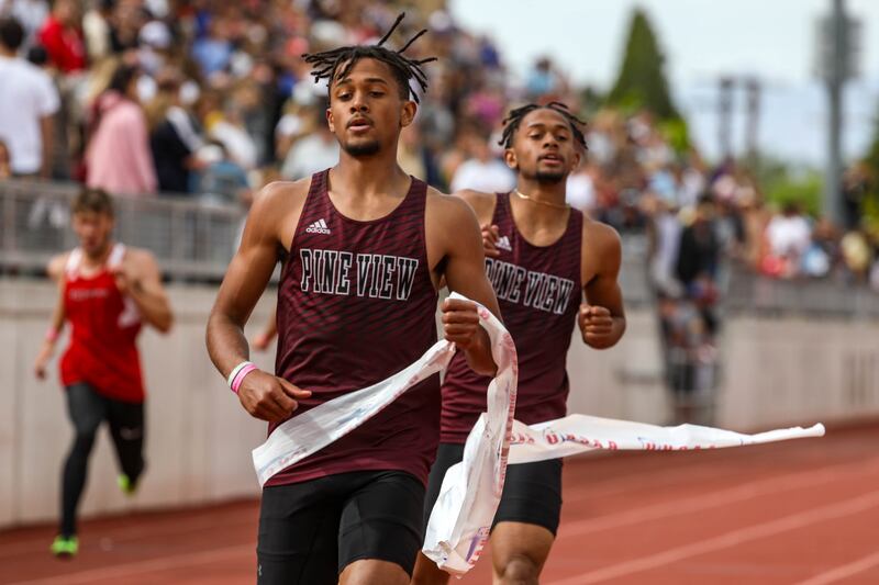 Pine View’s Marcus Mckenzie, left, and Dominique Mckenzie compete in the boys 200 meters 4A final at Davis High School.