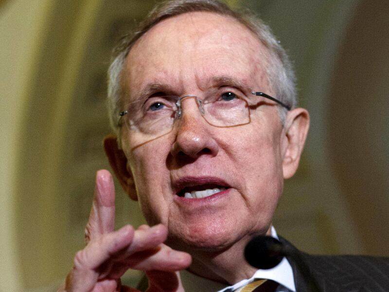 FILE - In this July 31, 2012 file photo, Senate Majority Leader Harry Reid of Nev. speaks on Capitol Hill in Washington. Reid mocked Republican vice presidential candidate, Rep. Paul Ryan, R-Wis. for misstating his marathon time, saying the vice president