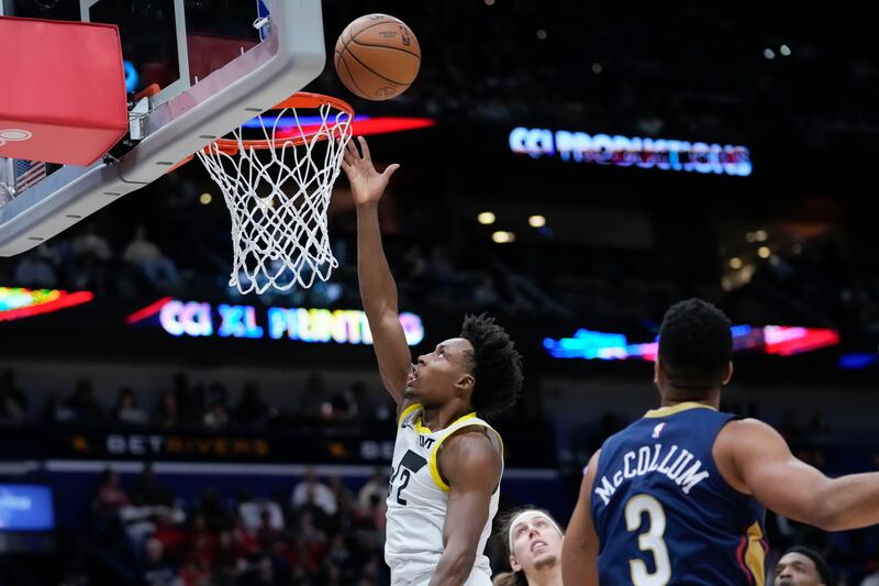 Utah Jazz guard Collin Sexton (2) goes to the basket in the first half of an NBA basketball game against the New Orleans Pelicans in New Orleans, Thursday, Dec. 28, 2023.