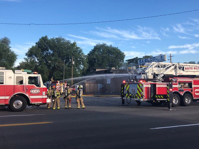Firefighters work to extinguish a fire at Ra-Elco Electronics, 2780 S. Main, in South Salt Lake on Thursday, June 21, 2018.