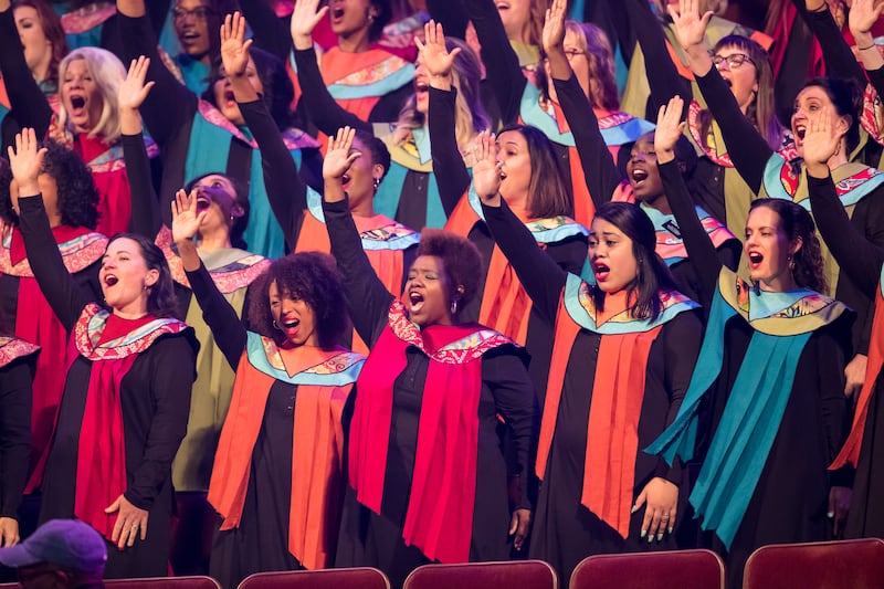 Choir members sing during a rehearsal Thursday for the LDS Church's worldwide "Be One" event set to take place Friday at the Conference Center.