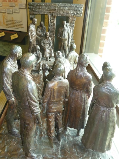 This sculpture by artist Lloyd Little depicts a Union soldier standing outside the plantation big house and reading the Emancipation Proclamation to slaves who were on the verge of being freed. It can be seen in the Booker T. Washington National Monument