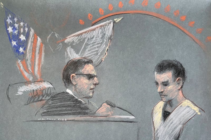 Massachusetts Air National Guardsman Jack Teixeira, right, appears in U.S. District Court in Boston on April 14, 2023.