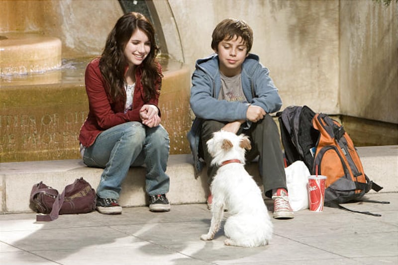 Emma Roberts, left, and Jake T. Austin star as siblings Andi and Bruce in the comedy/adventure "Hotel for Dogs."
