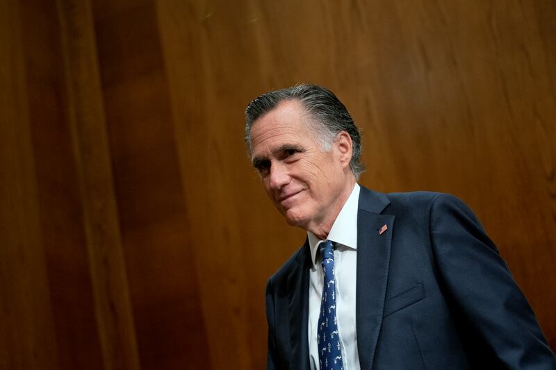 Sen. Mitt Romney, R-Utah, arrives on Capitol Hill in Washington.
