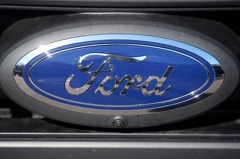 The Ford company logo shines.