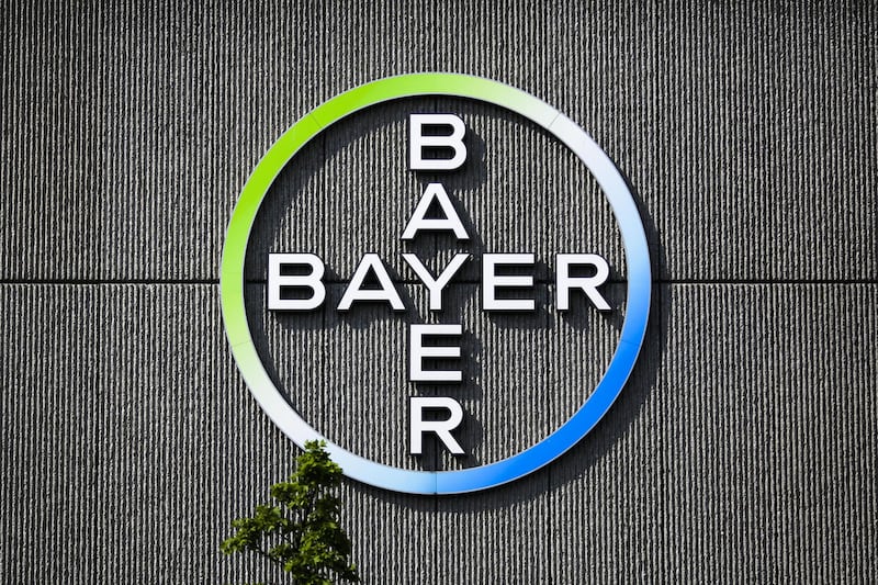 FILE - In this May 23, 2016, file picture the Bayer AG corporate logo is displayed on a building of the German drug and chemicals company in Berlin, Germany. German drug and farm chemical company Bayer AG said it has signed a deal Wednesday, Sept. 14, 201