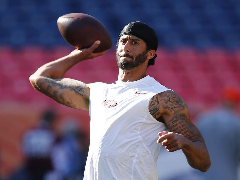 San Francisco 49ers quarterback Colin Kaepernick passes during warmups before a preseason NFL football game against the Denver Broncos, Saturday, Aug. 20, 2016, in Denver. (AP Photo/Jack Dempsey)