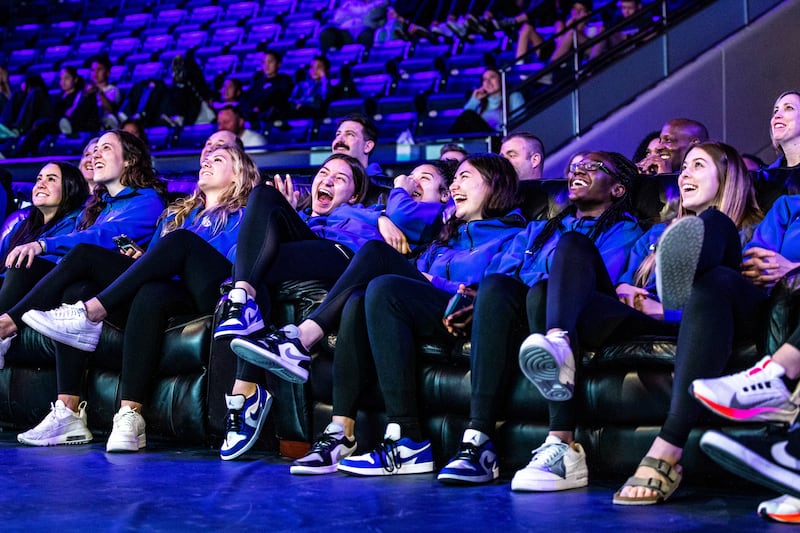 Members of the BYU women’s basketball team watch Selection Sunday from the Marriott Center floor March 13, 2022, in Provo.
