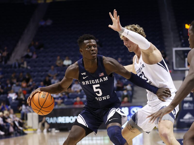 BYU Gideon George, left, dribbles against Caleb Lohner during Blue and White scrimmage at the Marriott Center in Provo, Friday, Oct. 29, 2021.